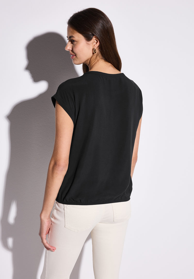 Bluse mit elastischem Saum