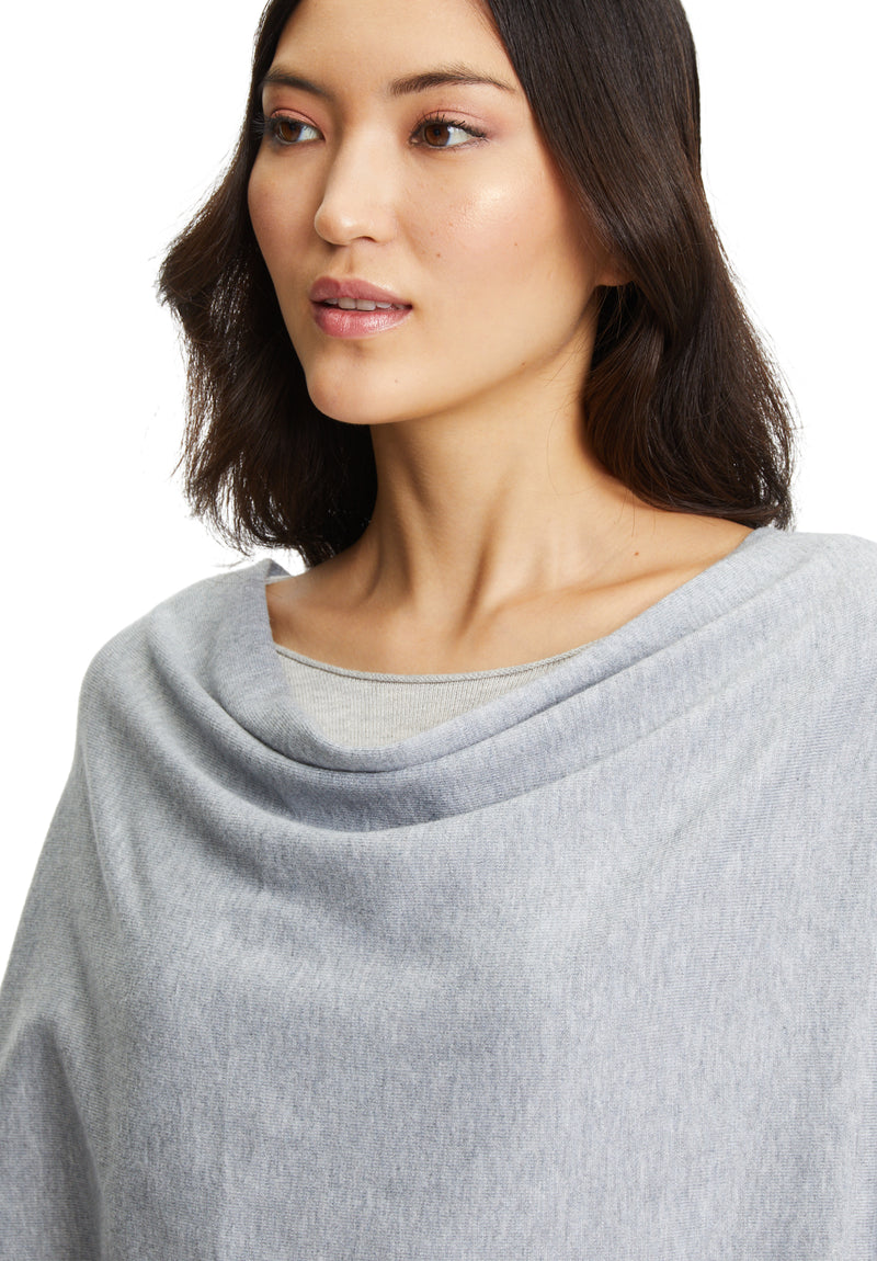 Strick-Poncho